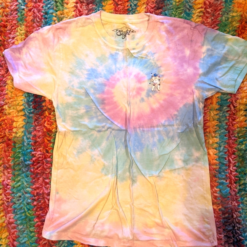 Tie dye shirt with astronaut logo